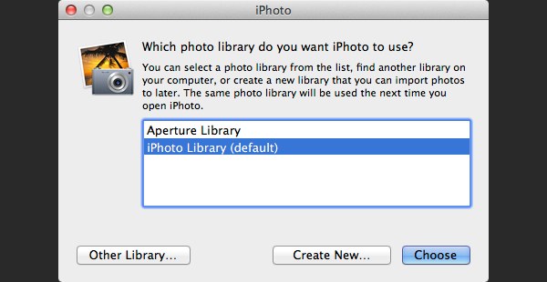 iPhoto will display a message to ask you choose a library, click Other Library